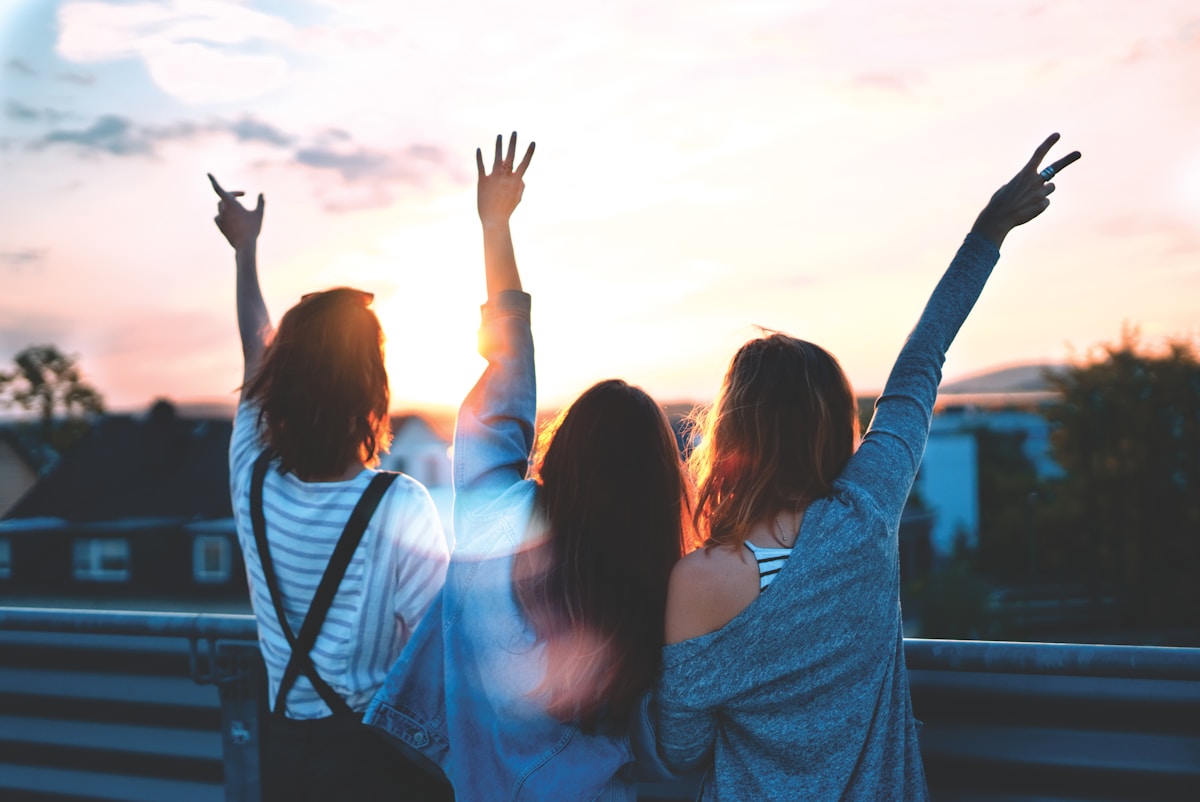 Friends enjoying a sunset together