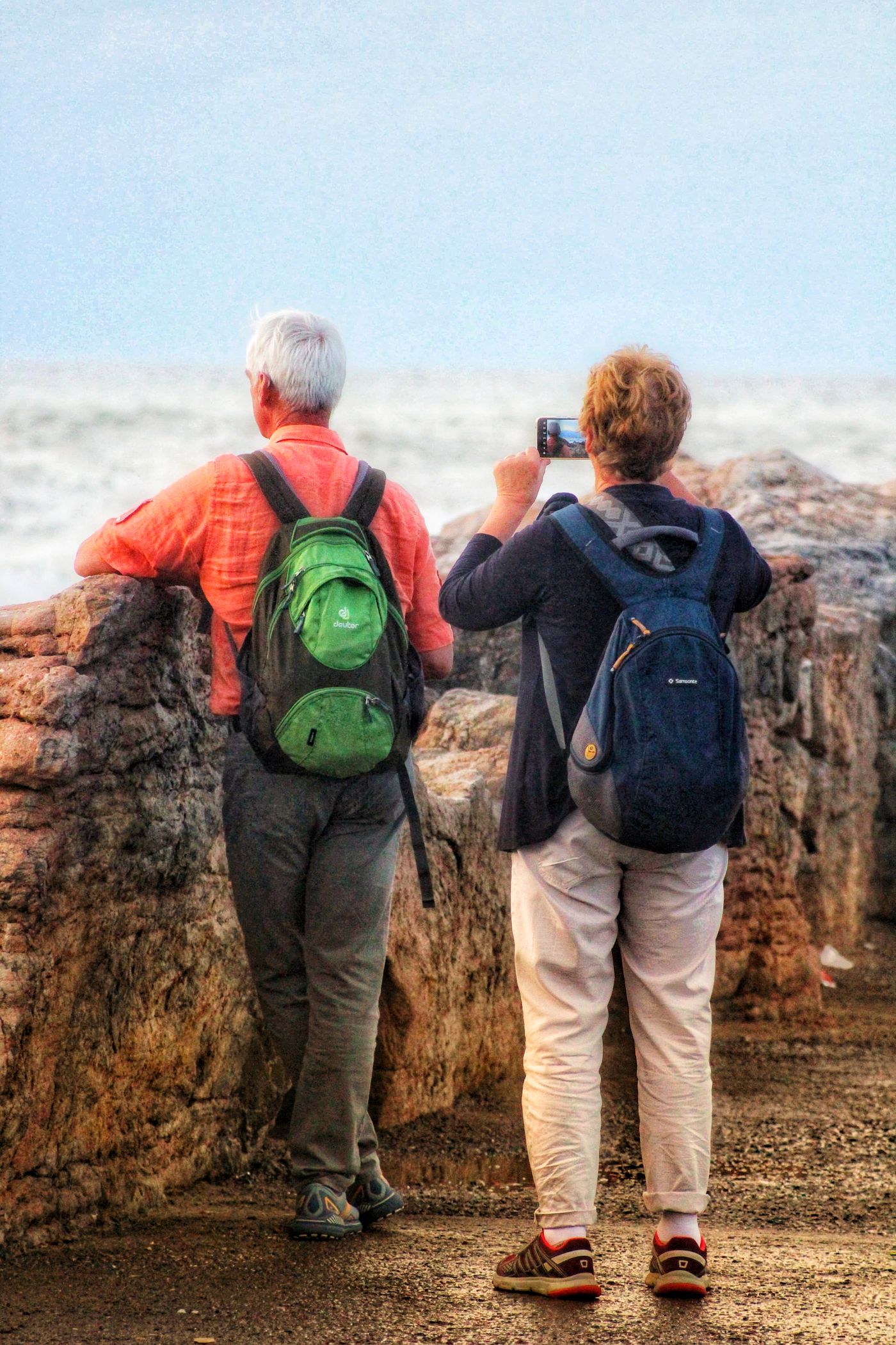 Senior travellers walking outdoors